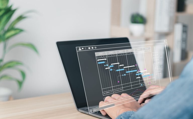 Businessman analyzing corporate work strategy. Data Management System to make report with KPI and metrics connected to database.